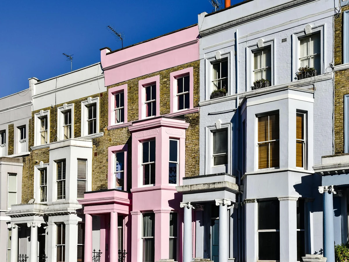 Colourful terraced houses with freshly painted masonry by Lincoln Decorators