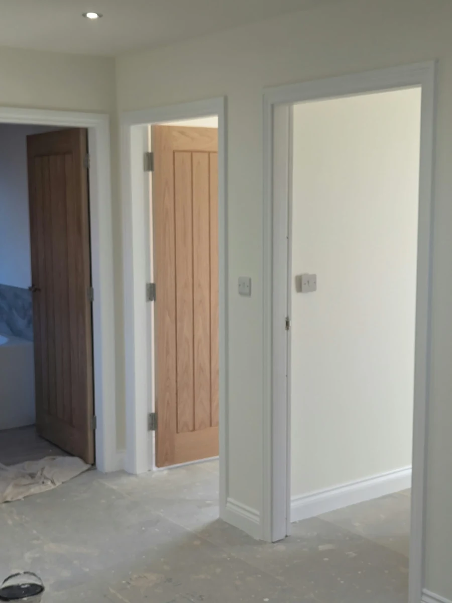 hallway-painting-freshly-decorated-doors-lincoln-decorators Freshly decorated hallway and painted doors in a Lincoln home by Lincoln Decorators