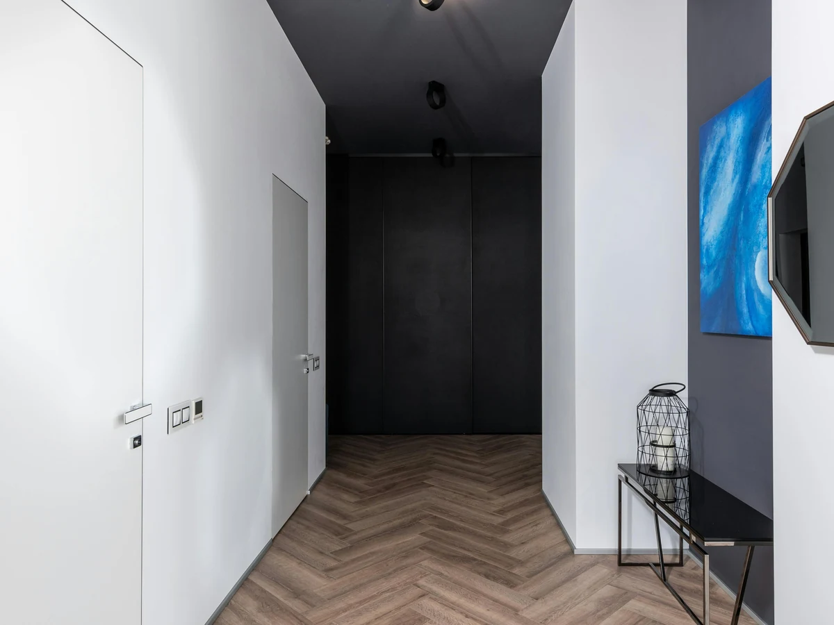 Minimalist dark hallway painting in Lincoln by Lincoln Decorators