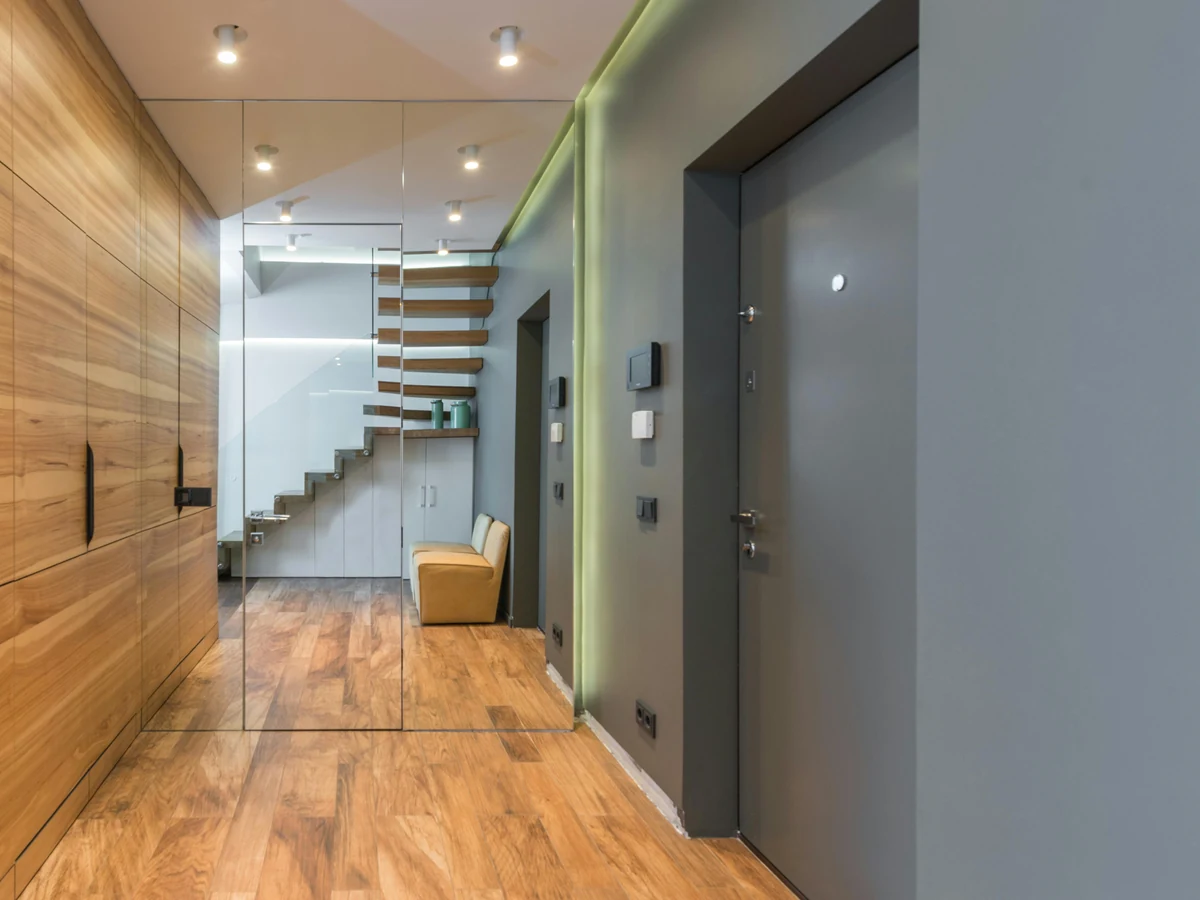 Modern hallway painting with wood panelling in Lincoln by Lincoln Decorators