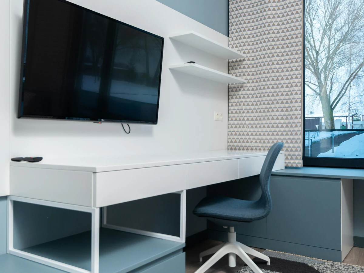 home-office-painting-modern-hotel-desk-lincoln-decorators Modern home office painting with desk setup in Lincoln by Lincoln Decorators