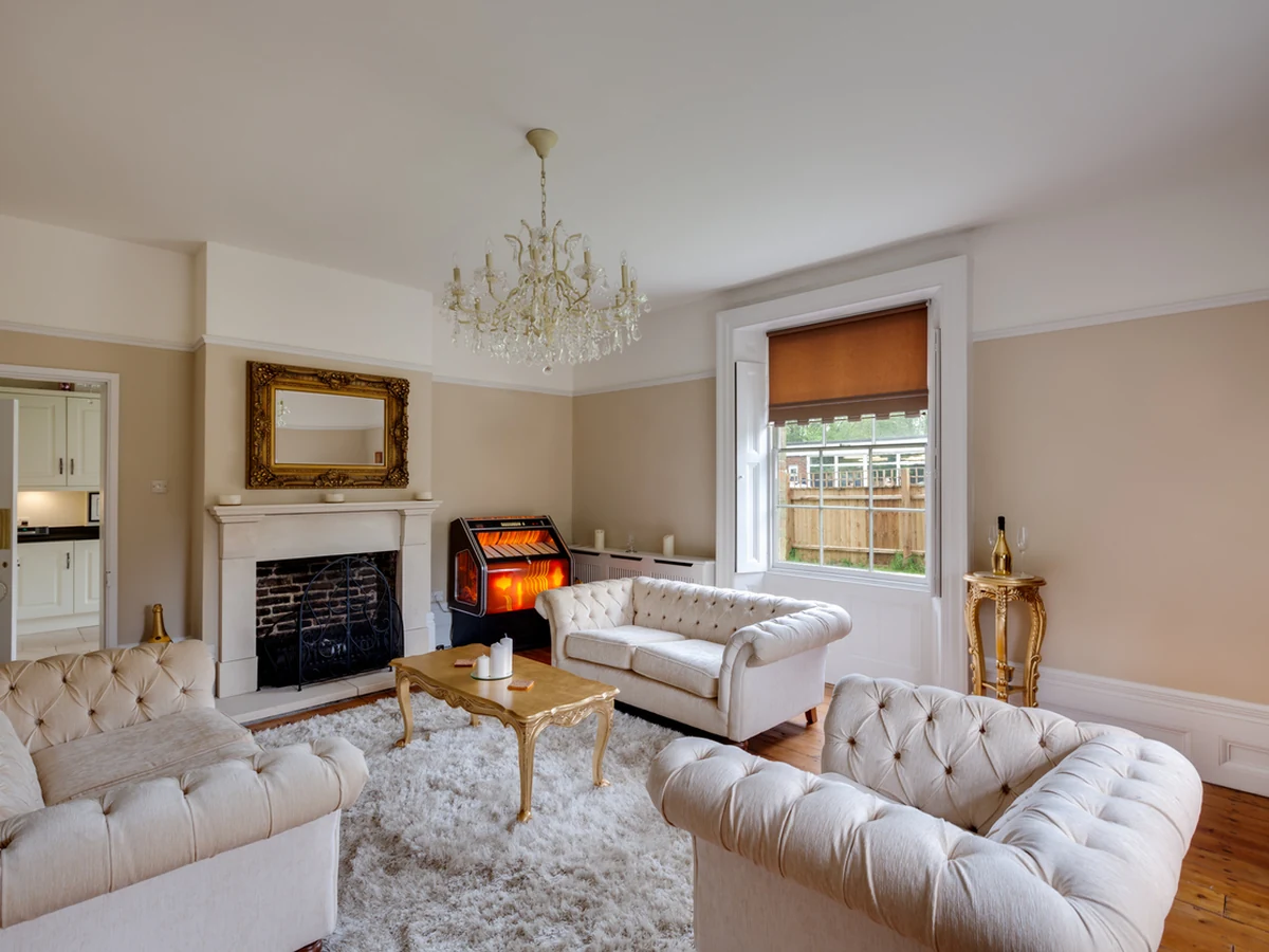 Elegant cream sitting room decorated by Lincoln Decorators