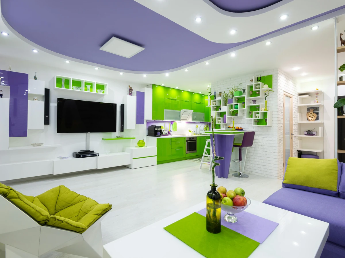 Vibrant green and purple living room decorated by Lincoln Decorators