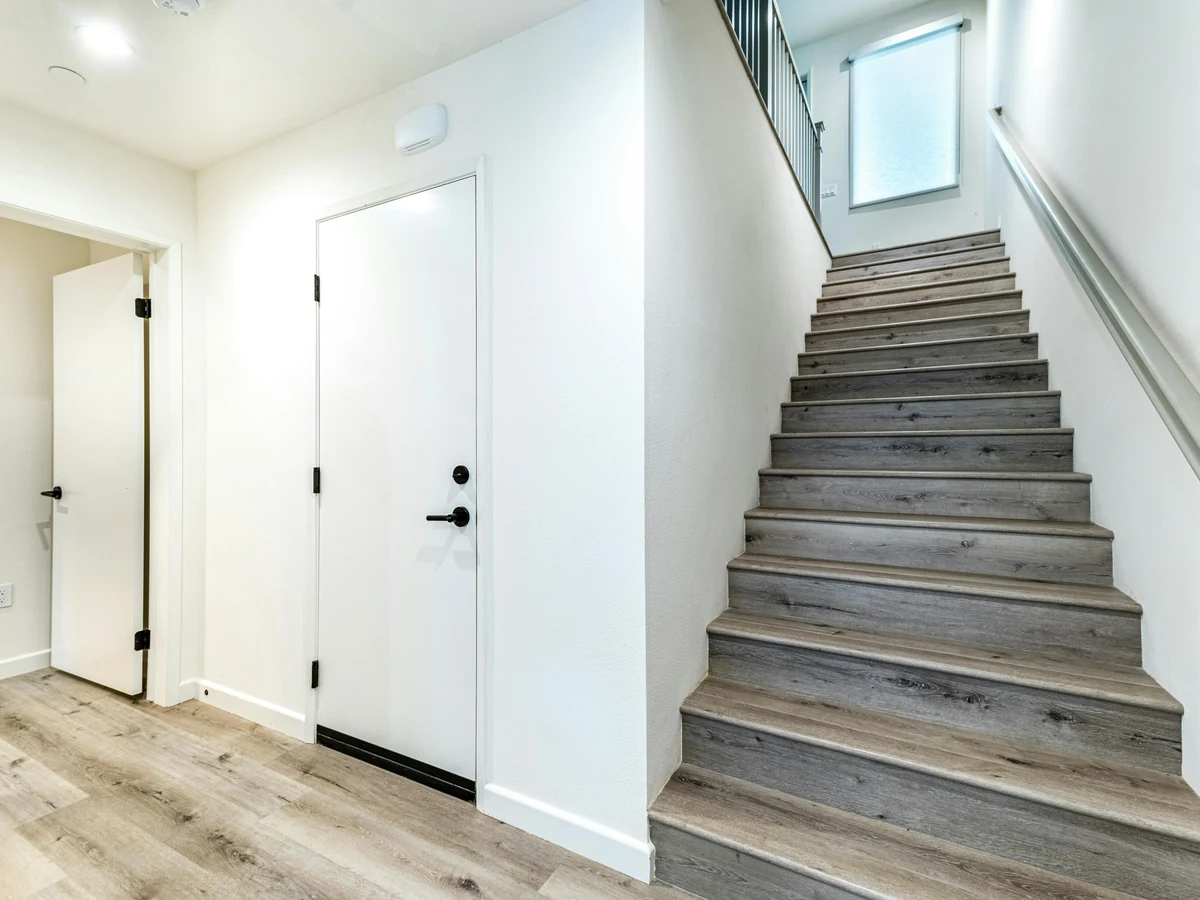 staircase-painting-white-walls-modern-lincoln-decorators Staircase painting with white walls in Lincoln by Lincoln Decorators